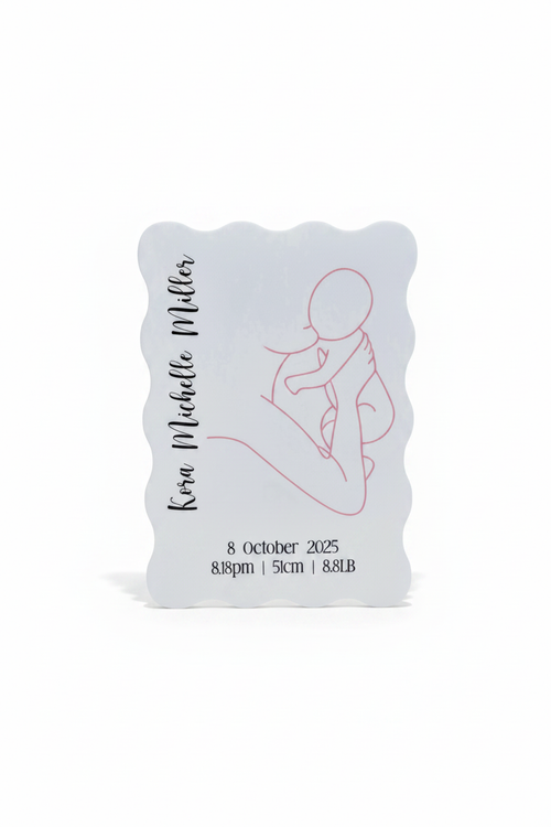Birth announcement plaque on white background - product shot